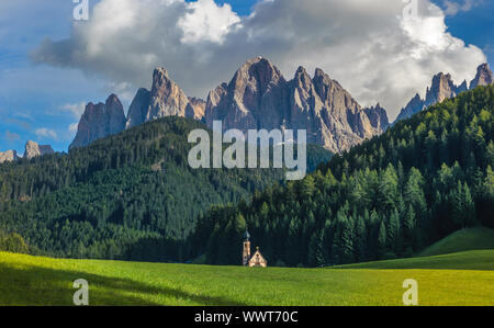 St. John church in front of the Odle mountains, Funes Valley, Dolomites, Italy Stock Photo