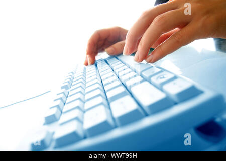 girl hands typing on keyboard macro close up Stock Photo