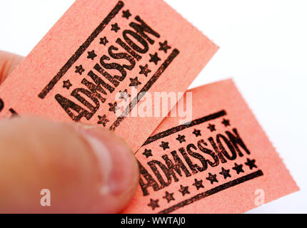 Holding Admission Tickets For A Carnival, Show, Theatre, Or Circus Stock Photo