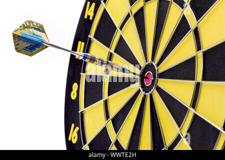 Arrow hits the bull's eye in target Stock Photo