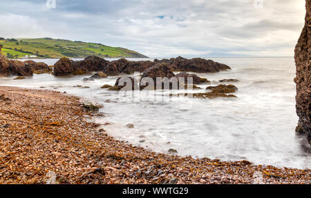 The Cushendun Caves in Northern Ireland Stock Photo