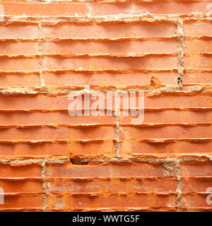 broken bricks in brickwall in wall restoration construction Stock Photo