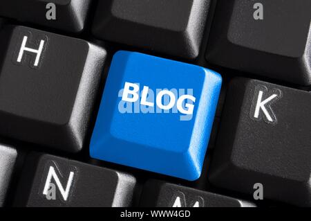 blue internet blog concept with button on computer keyboard Stock Photo