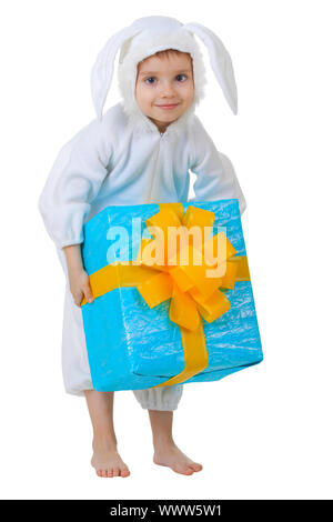 A child dressed as a rabbit with a gift in a box isolated on white background Stock Photo