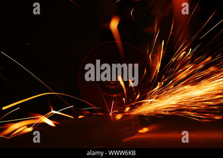 metal sawing close up sparks spray Stock Photo