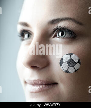 Closeup portrait of a happy football fan Stock Photo