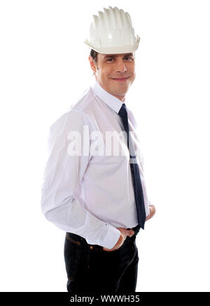 Young well dressed american constructor posing with hands in pocket Stock Photo