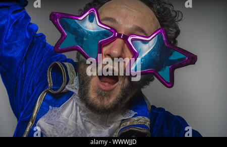 Hipster, Man with beard dressed like a pirate and ridiculous glasses, funny and humorous, costume party Stock Photo