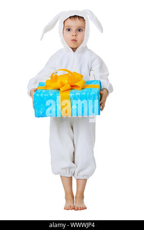 Funny boy dressed as a rabbit with a gift in the hands isolated on white background Stock Photo