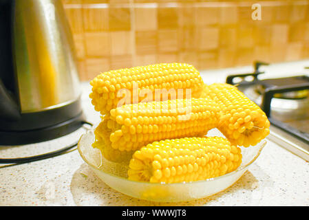 Fresh corn in the kitchen. Corncob. Rustic style. Stock Photo