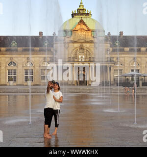 Couple makes a selfie in front of the the imperial palace, Bad Oeynhausen, Germany, Europe