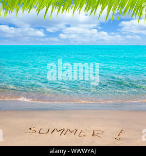 Caribbean tropical beach with Summer word written in sand Stock Photo