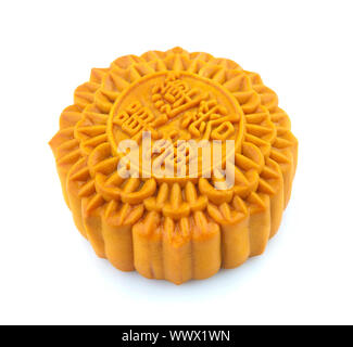 Chinese Mooncake isolated over white background. Chinese words on the mooncake means 'single yolk lotus'. Stock Photo