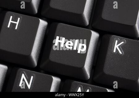 help support or assistance concept with button on computer keyboard Stock Photo