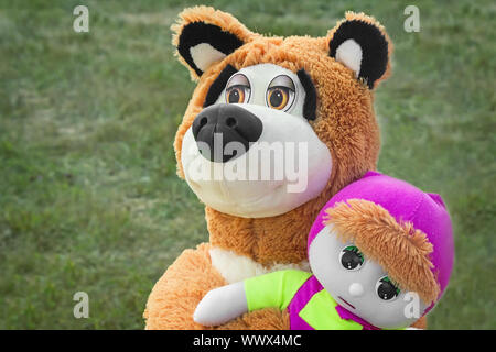 Baby soft toys are sold at the fair. Stock Photo