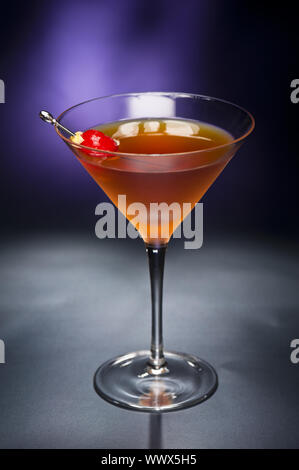 Manhattan cocktail with an orange twist as a garnish Stock Photo - Alamy