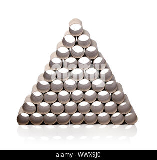 Empty toilet paper rolls stacked in triangle shape formation. Stock Photo