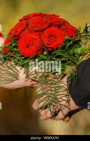 red roses as bridal bouquet for the wedding Stock Photo