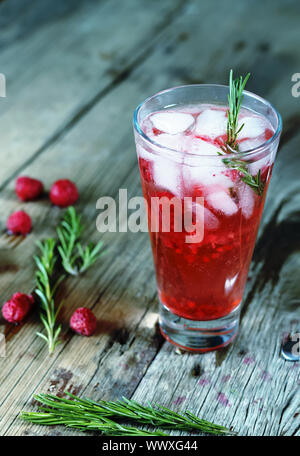 Alcohol cocktail or Fruity cocktail drink decorated  rosemary Stock Photo