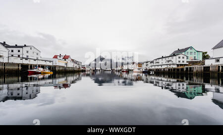 Scenic view of the waterfront harbor in Henningsvaer in summer,located on Austvagoya in the Lofoten Islands. Norway. Stock Photo
