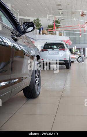 Russia, Izhevsk - July 18, 2019: New cars in the Toyota showroom. Famous world brand. Prestigious vehicles. Stock Photo