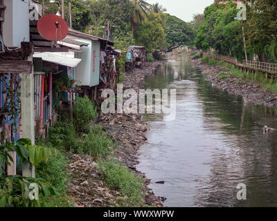 Bangkok / Thailand - October 08 2018: Riverside slums in Bangkok Thailand Stock Photo