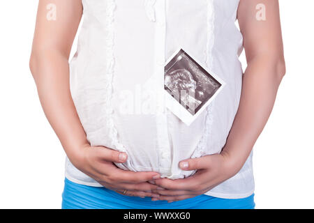 Pregnant Woman's Belly with Ultrasound Image, closeup Stock Photo