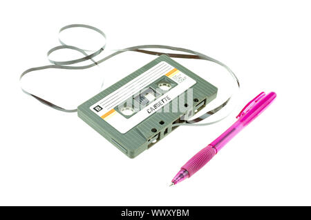 A pen pink and cassette tape compact  retro on white background Stock Photo