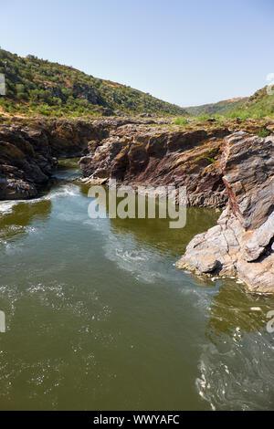 Pulo do Lobo or wolf's leap waterfall and cascade on river Guadiana, Alentejo, Portugal Stock Photo