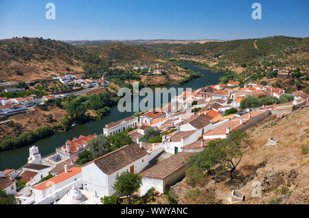 View of Guadiana river bend and residential houses of Mertola city on the ripe. Mertola. Portugal Stock Photo