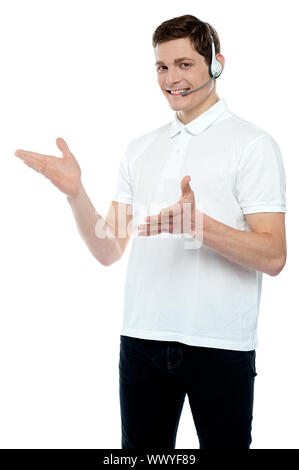 Male telemarketer communicating with client. Trying to convince customer Stock Photo