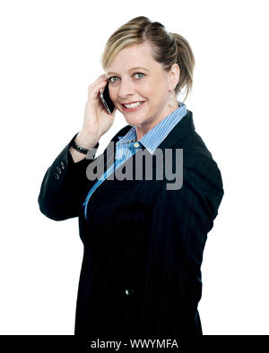Pretty woman on a business call communicating with client Stock Photo