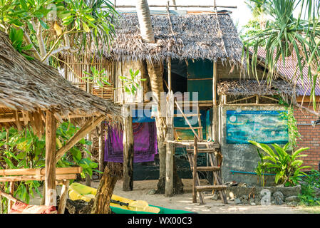 Stylish bamboo and palm thatch house at the beachside in Ko Lanta, Thailand Stock Photo