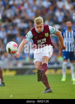 Ben Mee of Burnley during the Premier League match between Brighton and Hove Albion and Burnley at the American Express Community Stadium , Brighton , 14 September 2019 Photo Simon Dack / Telephoto Images.   Editorial use only. No merchandising. For Football images FA and Premier League restrictions apply inc. no internet/mobile usage without FAPL license - for details contact Football Dataco Stock Photo