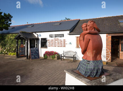 Lovers sculpture in the courtyard of the Old Blacksmith's Shop in Gretna Green, Scotland, UK Stock Photo