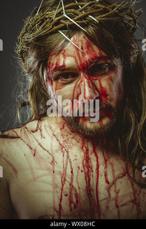 symbol, representation of the Calvary of Jesus Christ on the cross. Holy Week in Spain. man with crown of thorns Stock Photo