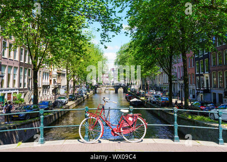Bicycle on a bridge, Leidsegracht canal, Amsterdam, North Holland, The Netherlands, Europe Stock Photo