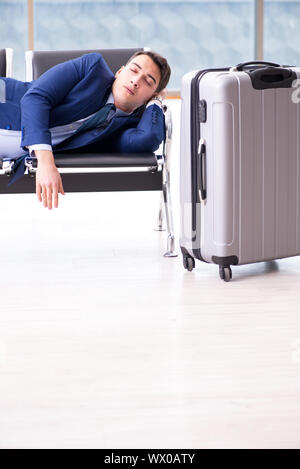 Businessman waiting at the airport for his plane in business cla Stock Photo