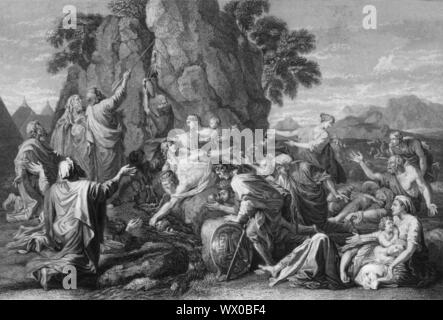 Moses smote the rock twice, and the water came out abundantly Stock