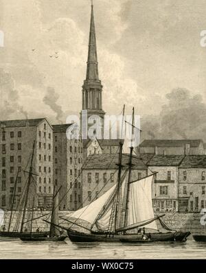 'St. George's Church from the Docks, Liverpool', c1830. Ships at the quayside, with warehouses and the spire of St George Derby Square. The church was consecrated in 1734, but falling congregations led to its closure anddemolition in 1899. Stock Photo