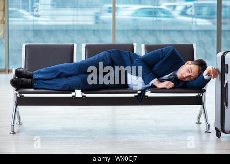 Businessman waiting at the airport for his plane in business cla Stock Photo