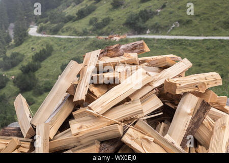 stacked firewood split logs outdoor Stock Photo