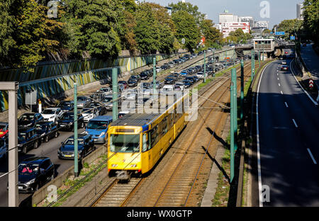 Essen, Ruhr area, North Rhine-Westphalia, Germany - Accident congestion on the motorway A40, public transport, here the subway U18 has free travel, be Stock Photo