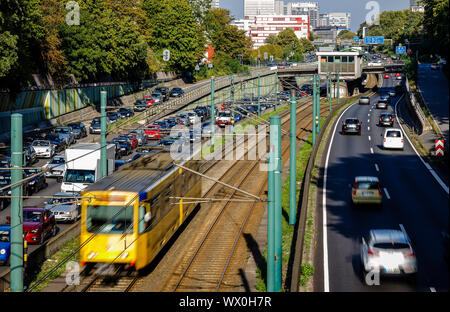 Essen, Ruhr area, North Rhine-Westphalia, Germany - Accident congestion on the motorway A40, public transport, here the subway U18 has free travel, be Stock Photo