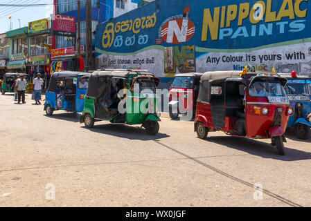 Tuk Tuks in the main shopping district of Haputale, Sri Lanka Stock Photo