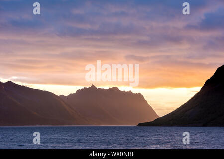 Sunset over Norwegian fjord, Senja, Norway, Scandinavia, Europe Stock Photo