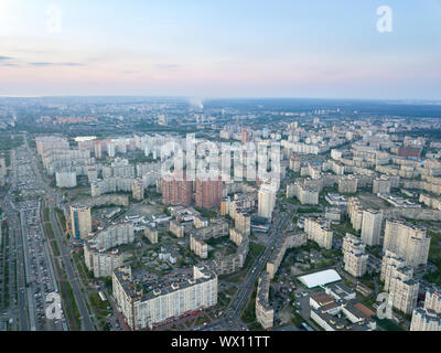 A bird's eye view, aerial panoramic view from drone to the Darnyts'kyi district of Kiev, Ukraine and the left bank of Dnieper. Stock Photo