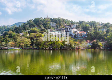 The lake in Kandy is a favourite place to be for locals and tourists from middle and upper class Stock Photo