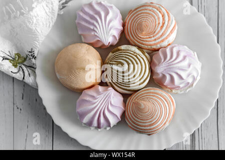 Marshmallows of different varieties on a plate. Stock Photo