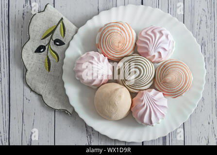 Marshmallows of different varieties on a plate. Stock Photo